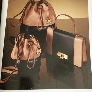 Dai que você que não gosta muito das bolsas do Michael Kors, se apaixona por essas... E agora produção???